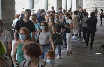 Visitors arrive on the reopening day of the Uffizi museum, in Florence