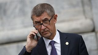 Czech Republic's Prime Minister Andrej Babis talks on the phone as he leaves after a meeting in Beja, Portugal, Saturday, Feb. 1, 2020