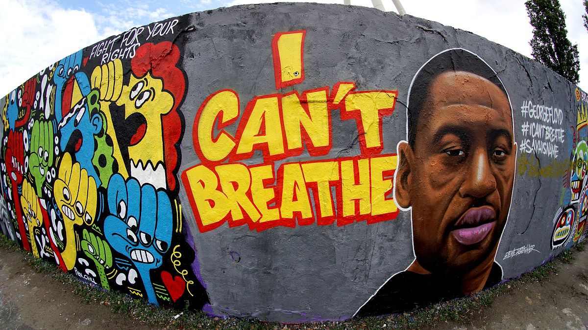 A graffiti by artist 'EME Freethinker' that expresses support of U.S. protests over the death of George Floyd in the public park 'Mauerpark' in Berlin, Germany