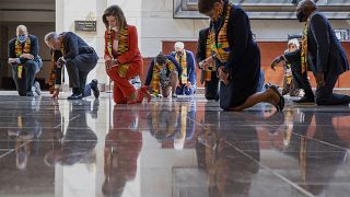 House Speaker Nancy Pelosi kneels with other US Democrats to pay tribute to George Floyd