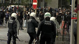 Belgian police clash with young men following peaceful protest