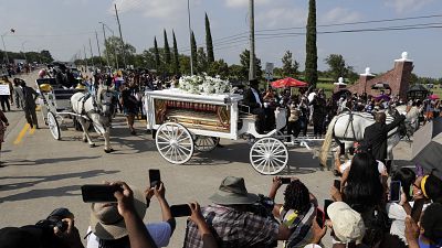 George Floyd's funeral procession arrives at Houston Memorial Gardens cemetery, Tuesday, June 9, 2020, in Pearland, Texas.