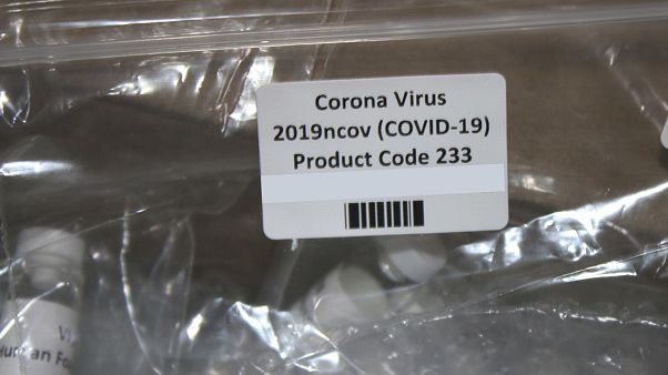This March 12, 2020, photo released by the U.S. Customs and Border Protection, shows a package containing suspected counterfeit COVID-19 test kits arriving from UK. This March 12, 2020, photo released by the U.S. Customs and Border Protection, shows a package containing suspected counterfeit COVID-19 test kits arriving from UK.