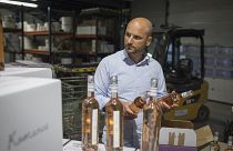 Sebastien Latz, director of French wine producer MDCV, inspects bottles of rosé at Chateau des Bertrands vineyard in Le Cannet-des-Maures, in the Provence region, Oct 2019