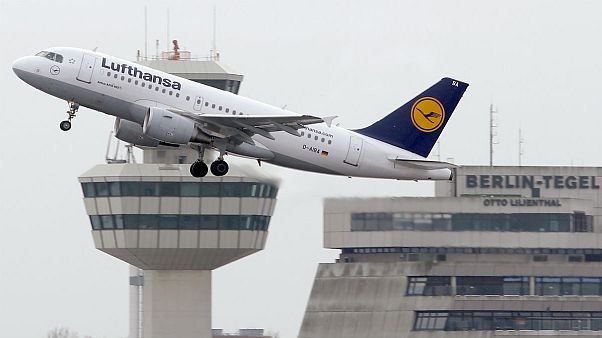 In this Sunday, Jan. 20, 2013 file photo an airplane of the airline 'Lufthansa' lifts off at the airport Tegel in Berlin, Germany. In this Sunday, Jan. 20, 2013 file photo an airplane of the airline 'Lufthansa' lifts off at the airport Tegel in Berlin, Germany.