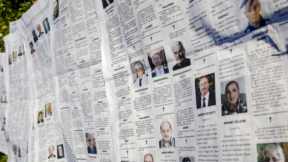 In this March 18, 2020 file photo, local newspaper Eco di Bergamo features several pages of obituaries in its March 17, 2020 edition, in Mediglia, Italy. 