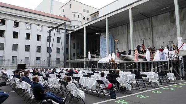 Wagner's "Das Rheingold" performed on a makeshift stage in a car park in the German capital. Wagner's "Das Rheingold" performed on a makeshift stage in a car park in the German capital.