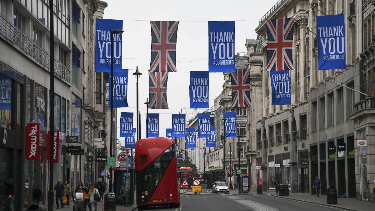 Union flags and support messages are seen in the shopping street, Oxford Street, ahead of the reopening of the non-essential businesses on Monday, June 15