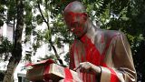 Red paint is seen on a statue of late Italian journalist Indro Montanelli, in Milan, northern Italy, Sunday, June 14, 2020