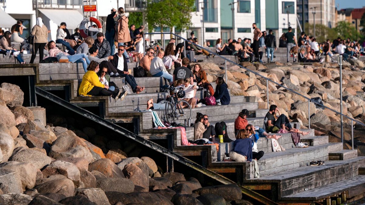 People enjoying the warm evening weather in Malmo, Sweden, Tuesday May 26, 2020.