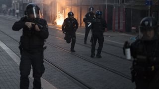 Police advance on protesters during a march against police brutality and racism in Marseille, France, Saturday, June 13, 2020.