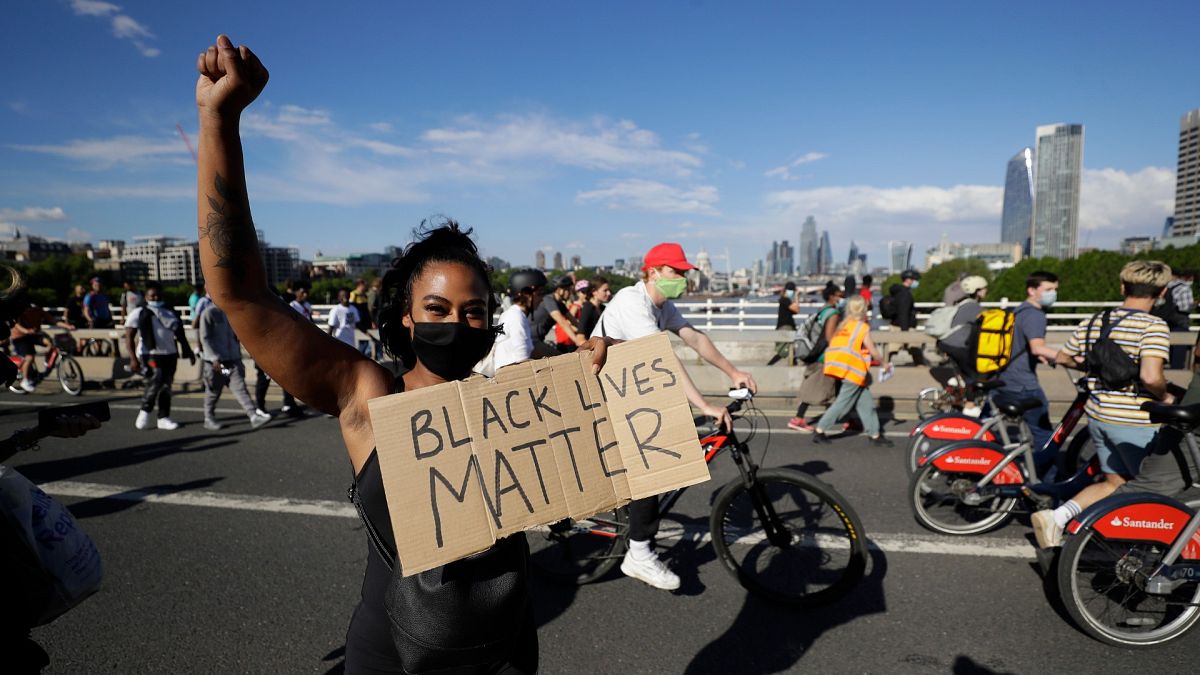 A member of Black Lives Matter movement during a protest in central London, Saturday, June 13, 2020.