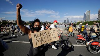 A member of Black Lives Matter movement during a protest in central London, Saturday, June 13, 2020.