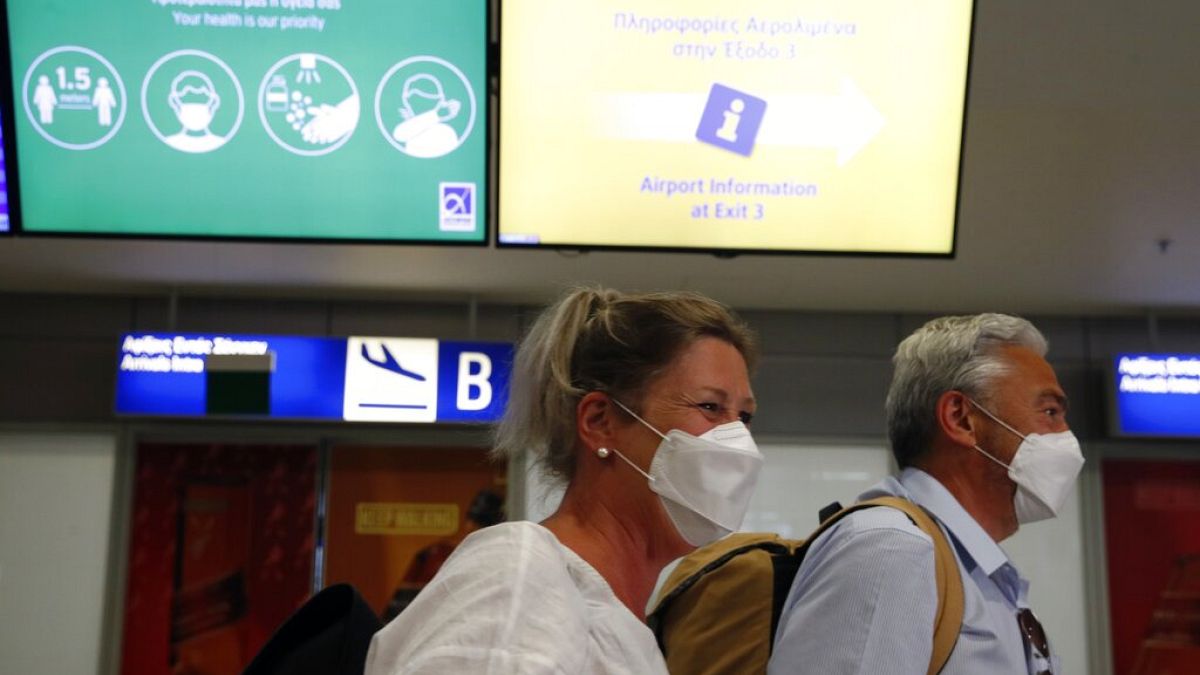 A Dutch couple arrives to the Eleftherios Venizelos International Airport