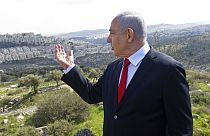 In this Feb. 20, 2020 file photo, Israeli Prime Minister Benjamin Netanyahu visits the area where a new neighborhood is to be built in the East Jerusalem settlement of Har Hom