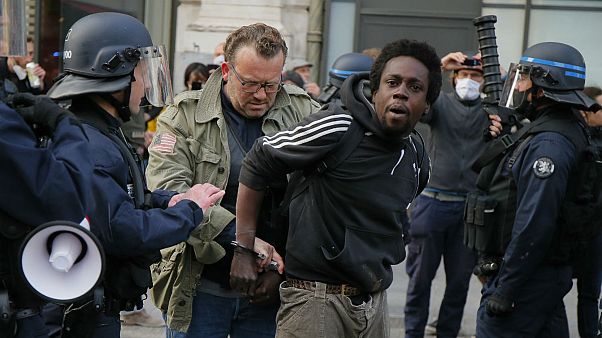 A protester is detained during an anti-racism demonstration, Thursday, June 4, 2020 in Lille, northern France A protester is detained during an anti-racism demonstration, Thursday, June 4, 2020 in Lille, northern France