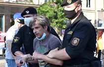 Belarus' riot police detain a protester in Minsk on June 19, 2020