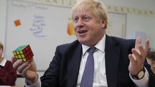 Britain's Prime Minister Boris Johnson visits the West Monkton CEVC Primary School on a General Election campaign trail in Taunton, England, Thursday, Nov. 14, 2019