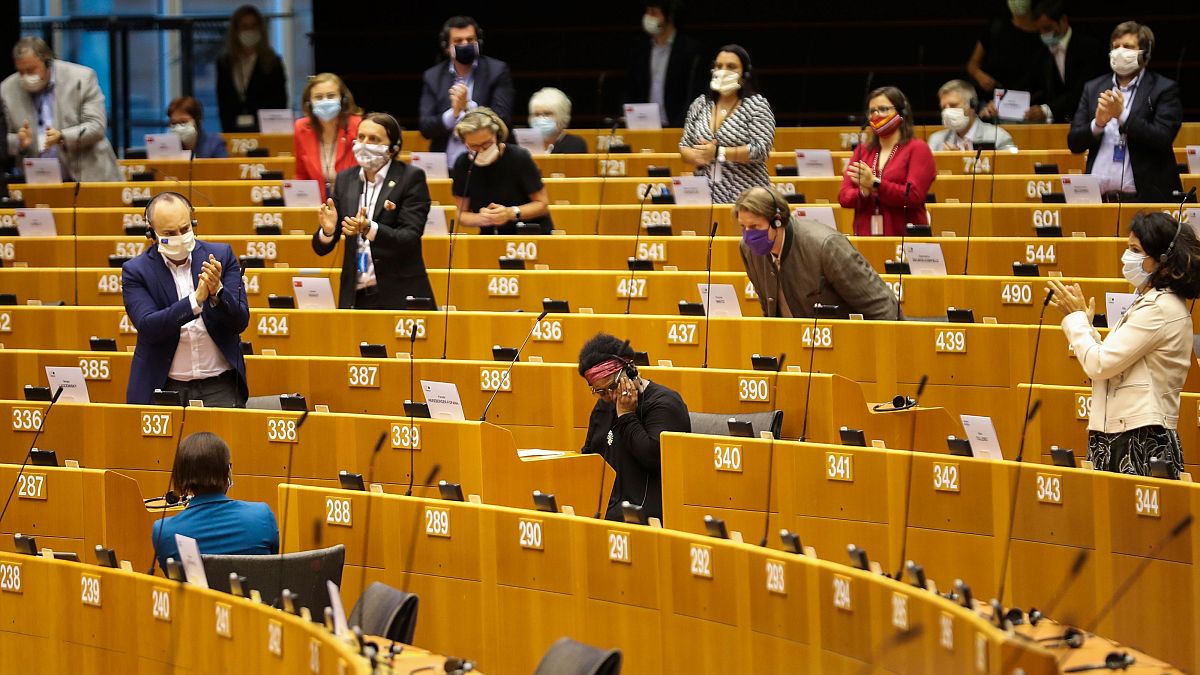 MEP Pierrette Herzberger-Fofana is applauded by colleagues following her speech on racism in Parliament