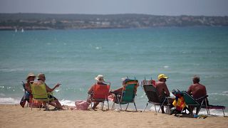 Touristen am Strand von Palma de Mallorca, 16.Juni 2020