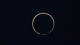 Skywatchers wowed by rare 'ring of fire' eclipse 