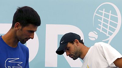 Novak Djokovics a már biztosan fertőzött Grigor Dimitrov mellett