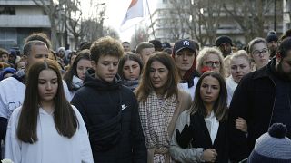 Doria Chouviat (C) and her relatives at a rally in January for her late husband, Cedric Chouviat, a delivery driver who died after being held during a police check.