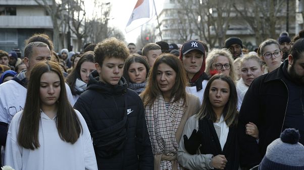 Doria Chouviat (C) and her relatives at a rally in January for her late husband, Cedric Chouviat, a delivery driver who died after being held during a police check. Doria Chouviat (C) and her relatives at a rally in January for her late husband, Cedric Chouviat, a delivery driver who died after being held during a police check.