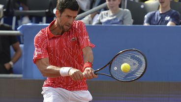 Serbia's Novak Djokovic returns the ball during an exhibition tournament in Zadar, Croatia, Sunday, June 21, 2020.
