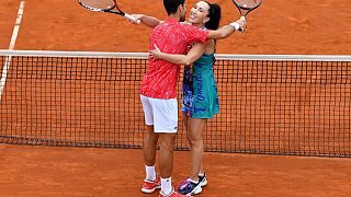 On June 12, 2020 Serbia's Novak Djokovic hugs Jelena Jankovic during a charity exhibition in Belgrade