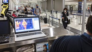 A laptop screen from an infrared camera monitoring the ambient body temperatures of incoming travellers arriving at Cyprus' Larnaca International Airport, June 9, 2020.