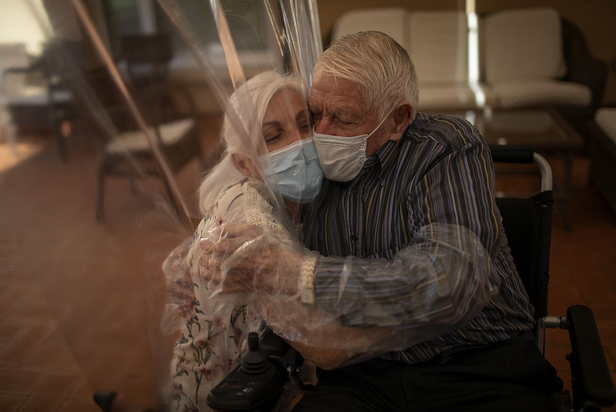 In pictures: Emotions overflow as Spanish nursing home allows hugs ...