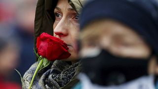 A woman takes parts in a rally on International Women's Day in Warsaw, Poland, Sunday, March 8, 2020