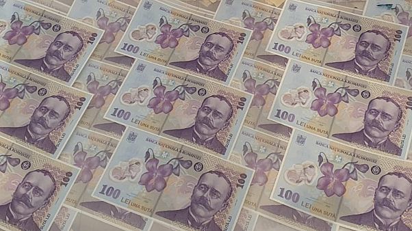 Romania's crime unit said the gang was responsible for 350,000 euros in damages and over 17,000 fake banknotes.