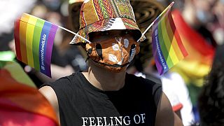 A protester takes part in an LGBTQ+ rally in Berlin, Germany, Saturday, June 27, 2020.