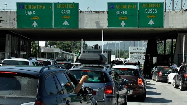 Cars waiting on the border to enter in Greece. Cars waiting on the border to enter in Greece.