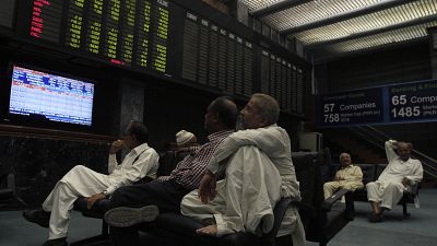 FILE: Pakistani stock brokers monitor the market at Karachi Stock Exchange in Karachi, Pakistan, Wednesday, Nov. 9, 2016.