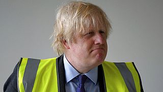 Britain's Prime Minister Boris Johnson visits the construction site of Ealing Fields High School in west London, Monday June 29, 2020