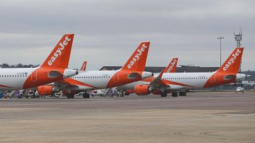 EasyJet planes parked on the tarmac at Luton Airport