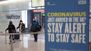 Passengers arriving at Heathrow Airport on the day new 14-day self-isolation rules came into force for people arriving from overseas. London, June 8, 2020.