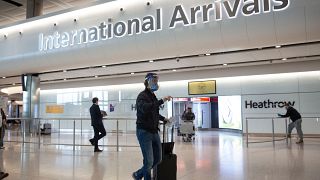 Passengers arrive at Heathrow airport