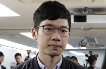 In this Jan. 27, 2018, file photo, pro-democracy activist Nathan Law attends a press conference in Hong Kong. He has now left the city for an undisclosed location.