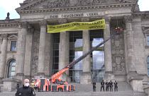 Protests as German MPs back scrapping coal-fired power plants by 2038