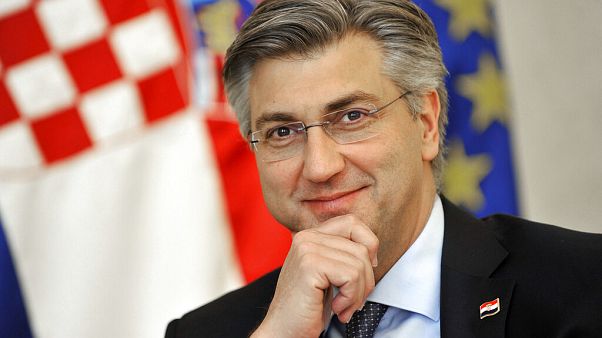 Andrej Plenkovic, Croatia's Prime Minister incumbent smiles as he addresses the media in Zagreb, Croatia, Thursday, April 9, 2020 Andrej Plenkovic, Croatia's Prime Minister incumbent smiles as he addresses the media in Zagreb, Croatia, Thursday, April 9, 2020