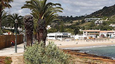 A view of the beach in Praia da Luz, in Portugal's Algarve coast, Thursday, June 4, 2020. 