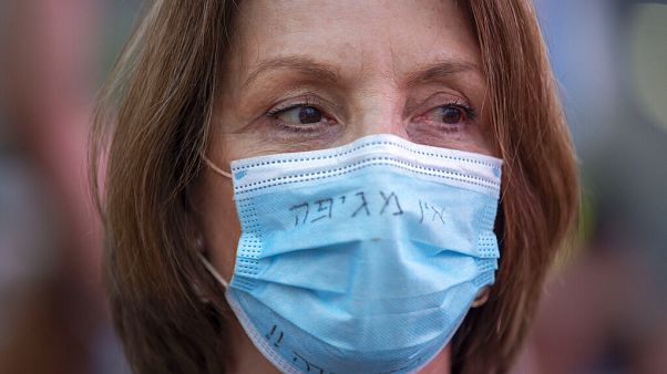 Protest gegen Regierungschef Netanjahu - mit Maske Protest gegen Regierungschef Netanjahu - mit Maske