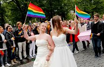 Participants of the lesbian, gay, bisexual and transgender (LGBT) "Euro Pride" parade march through Oslo