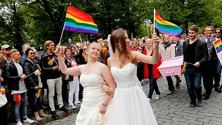 Participants of the lesbian, gay, bisexual and transgender (LGBT) "Euro Pride" parade march through Oslo