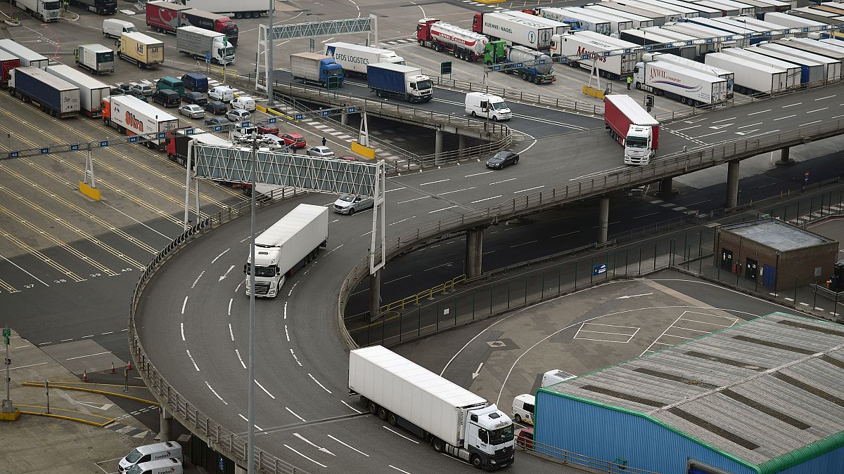 Freight lorries prepare to leave the Port of Dover after disembarking from a cross-channel ferry, in Dover on the south coast of England on June 12, 2020. 