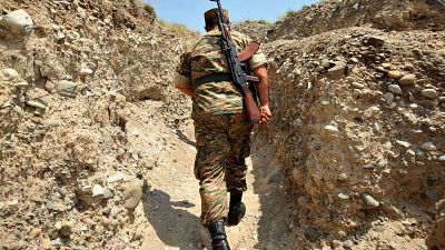 ARCHIVES - 11 Juillet 2012, un soldat dans une tranchée dans le Haut-Karabakh